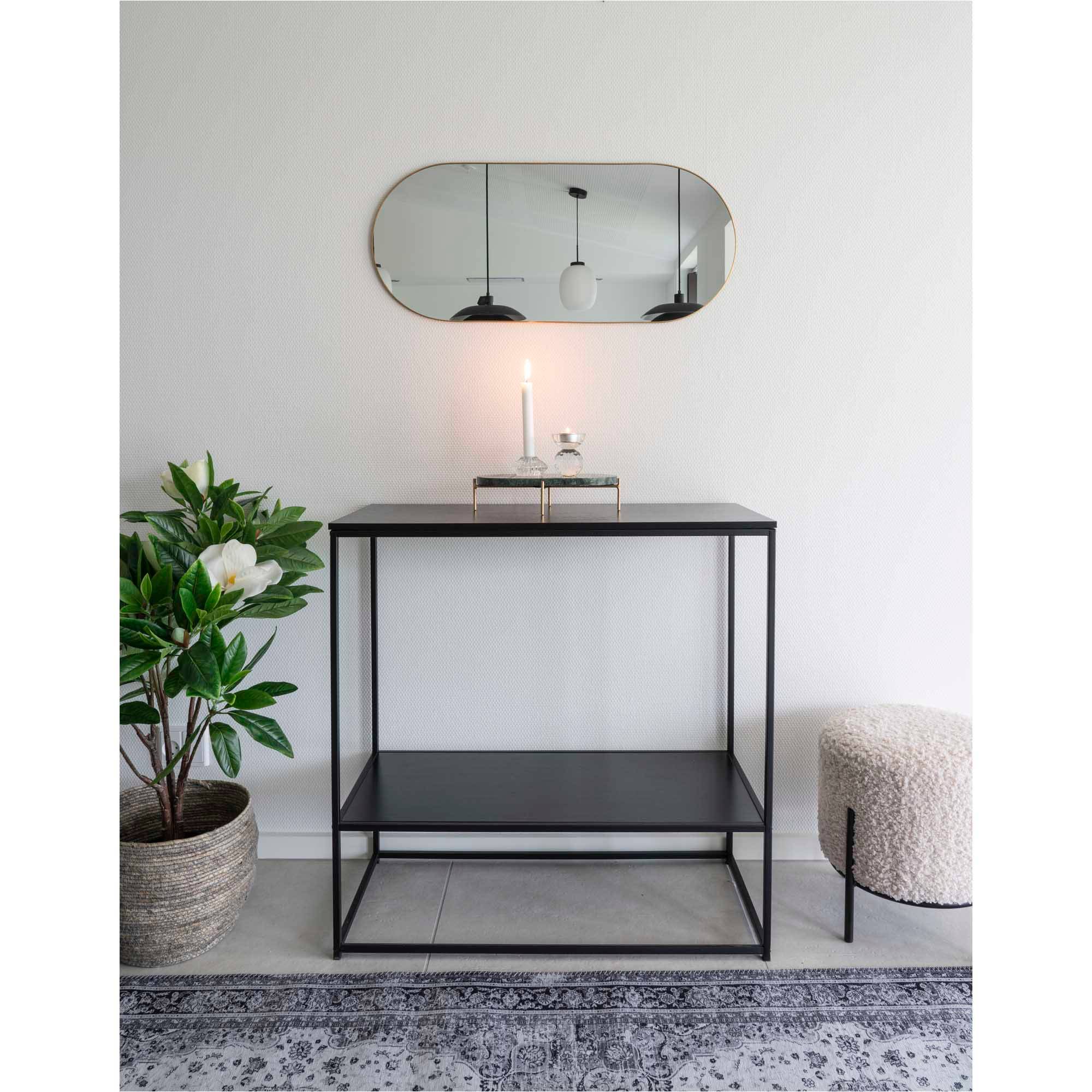 miroir jersey ovale avec cadre aspect laiton delamaison